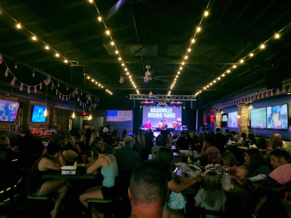 A packed venue watching a Nashville Rising Song round
